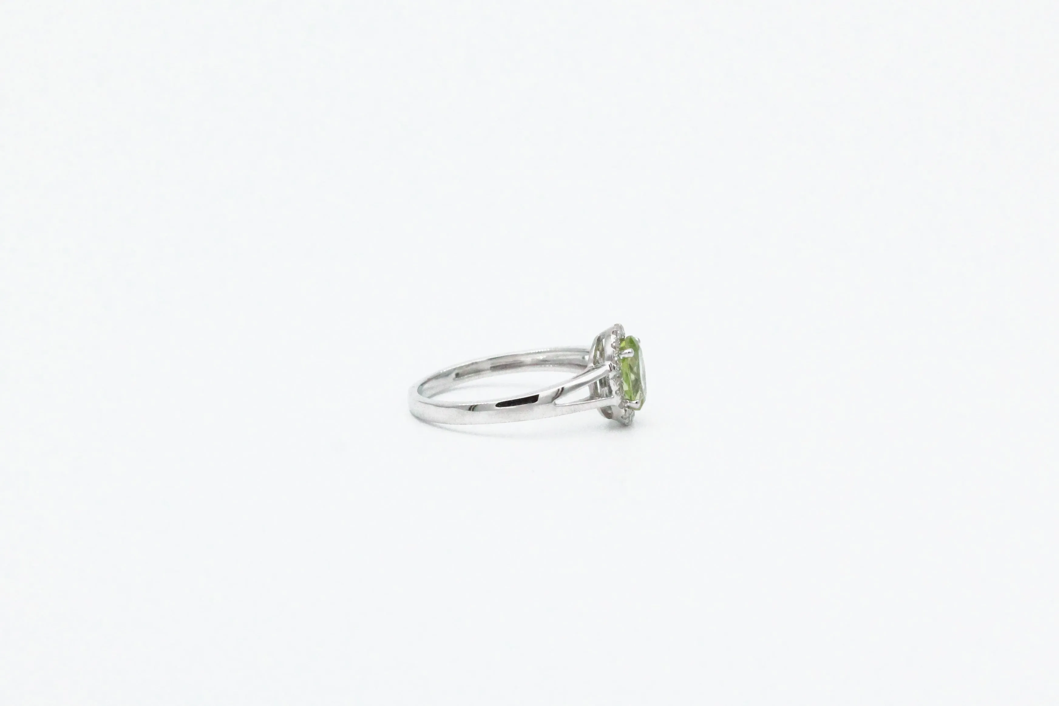 White Gold Oval Peridot Split Shank Halo Ring