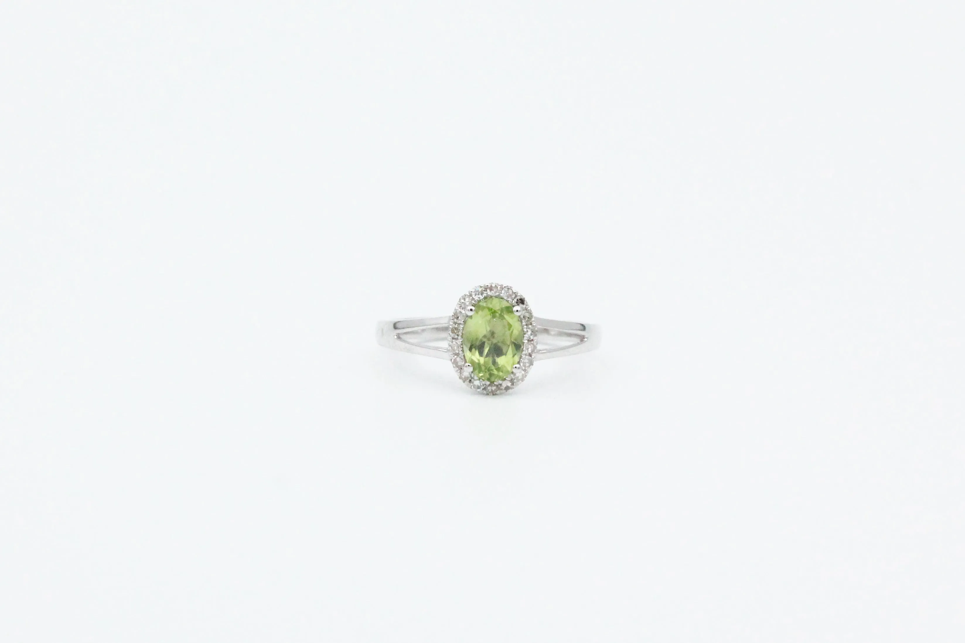 White Gold Oval Peridot Split Shank Halo Ring